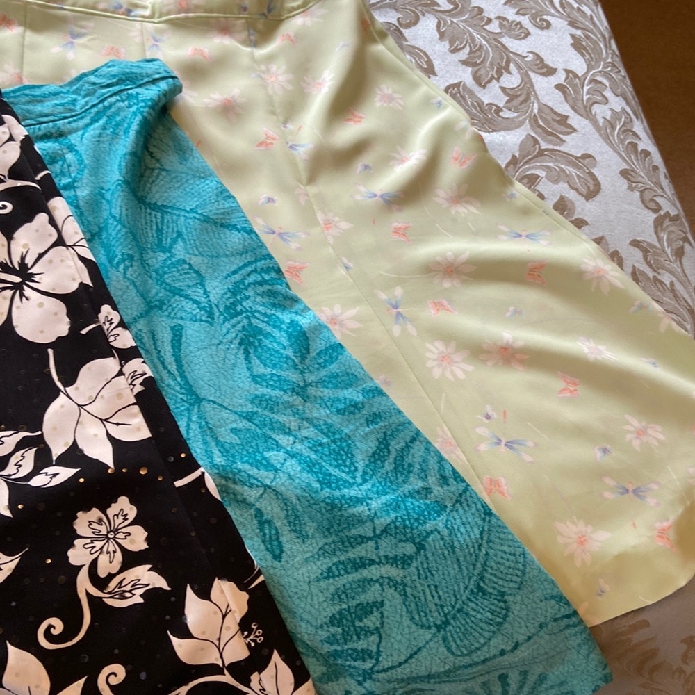 Handmade. Bundled 3 flare skirts. Waist 32” with adjustable band. Length 25”